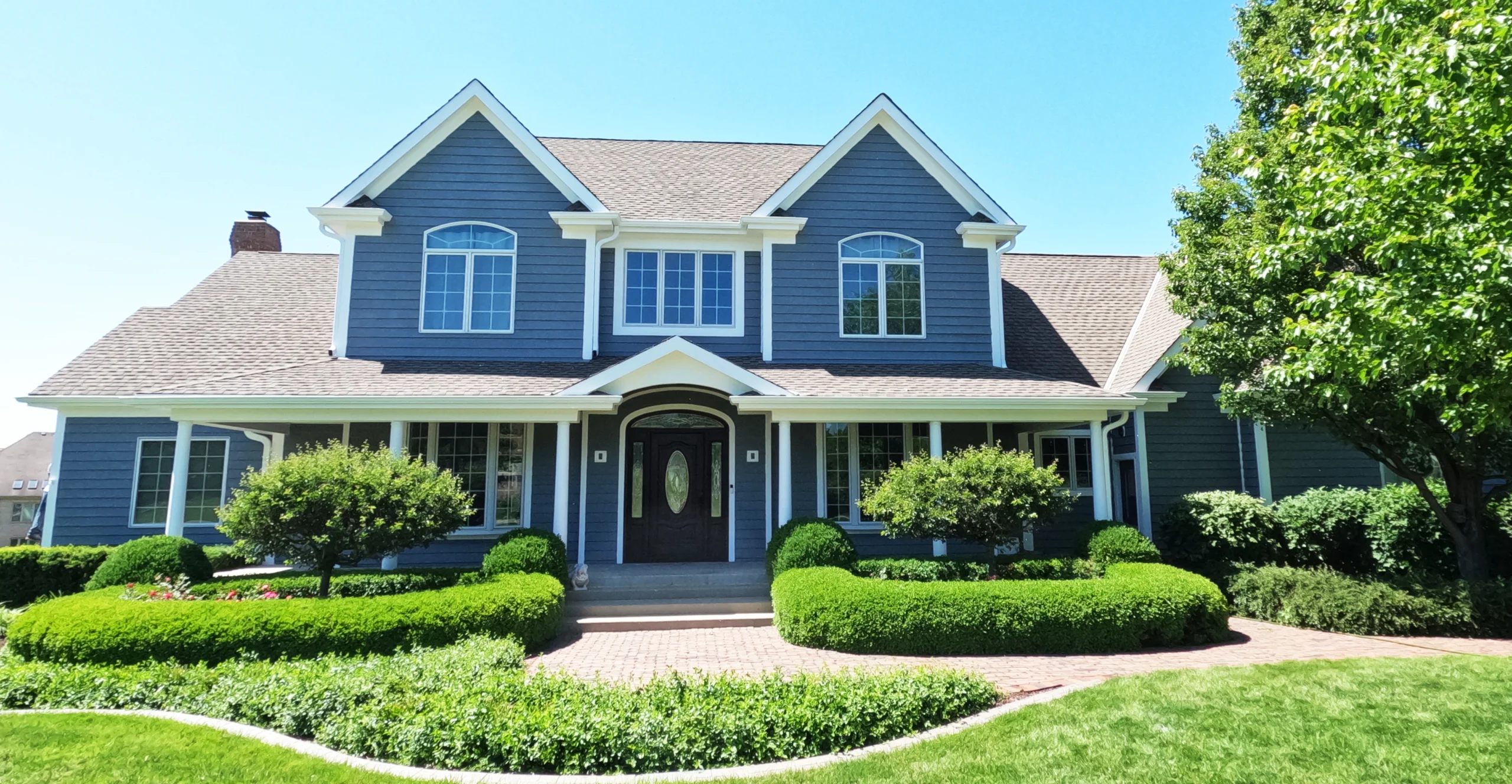 After Pic of Cedar Sided House Coated With Home Shield Coating® Top Coat.