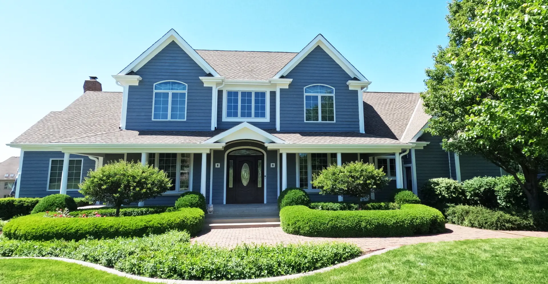 After Pic of Cedar Sided House Coated With Home Shield Coating® Top Coat.
