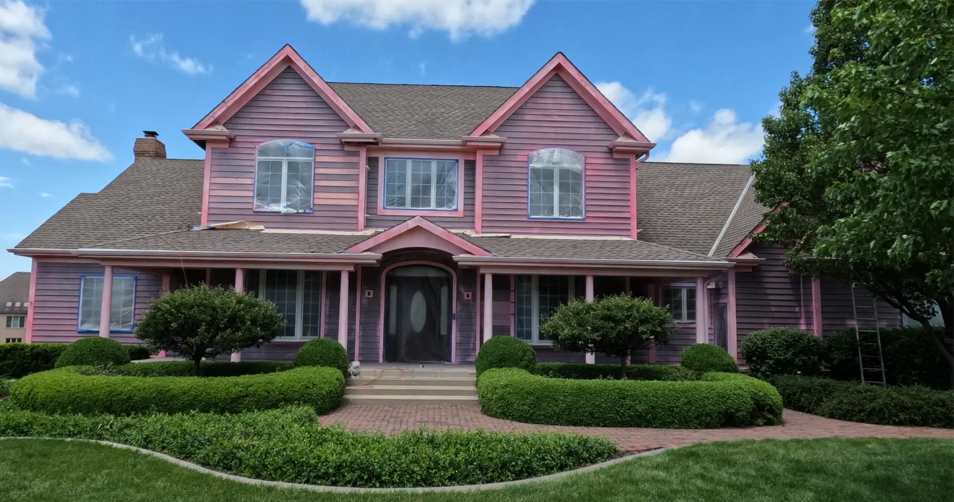 MchenryCedarBeforeSlider Before Pic of Cedar Sided House Primed With With Home Shield Coating® Pink Primer Bonding Agent.